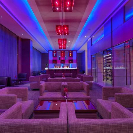 Radisson Blu Hotel, Greater Noida Dış mekan fotoğraf The bar at the 101 lounge