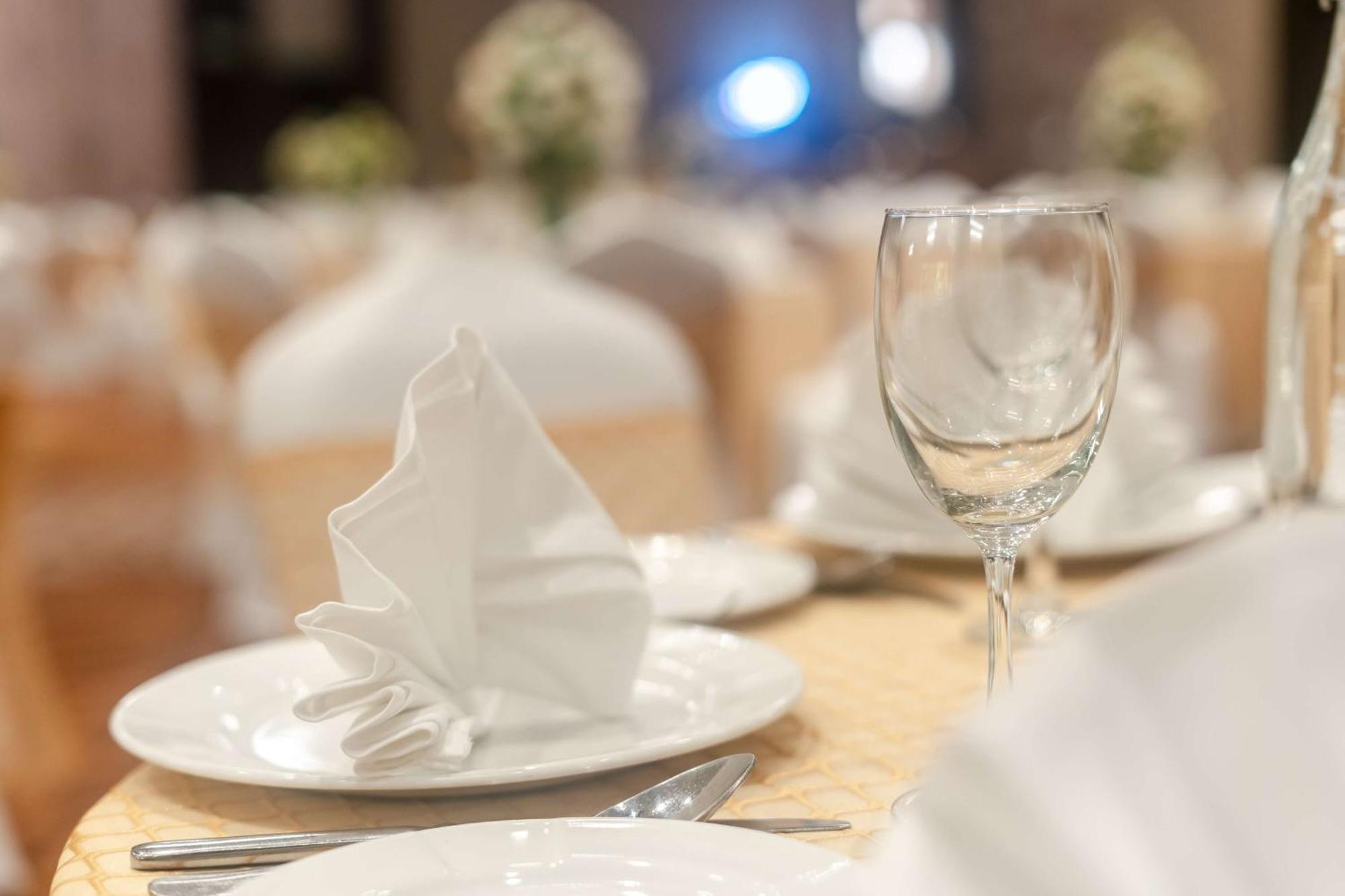 Radisson Blu Hotel, Greater Noida Dış mekan fotoğraf A table set for fine dining